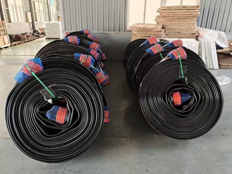 High Volume 12 Inch Layflat Hose On Steel Reels خرطوم مسطح عالي الحجم مقاس 12 بوصة على بكرات فولاذية